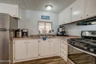 *ON LEASED LAND*

Paradise is Found! Don't judge the book by on London Bridge Golf Course in Arizona - for sale on GolfHomes.com, golf home, golf lot