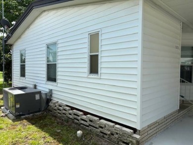 This home is in a 55 plus community with a monthly lot rent of on Crystal Lake Club in Florida - for sale on GolfHomes.com, golf home, golf lot