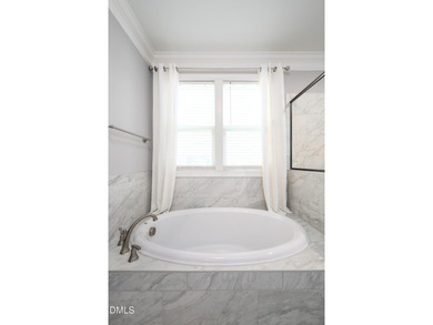 Set at the end of a cul-de-sac on the golf course in the on Chapel Ridge Golf Club in North Carolina - for sale on GolfHomes.com, golf home, golf lot