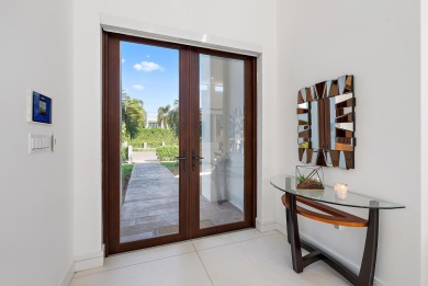 Welcome to a beautiful, newly built, modern home on one of Lake on Lake Worth Municipal Golf Course in Florida - for sale on GolfHomes.com, golf home, golf lot