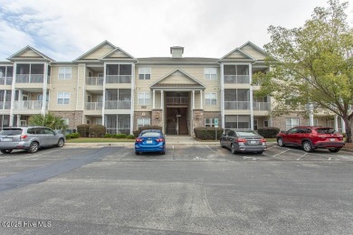 Perfect first floor 2BR/2BA beach condo priced to sell with on Crow Creek Golf Club in North Carolina - for sale on GolfHomes.com, golf home, golf lot