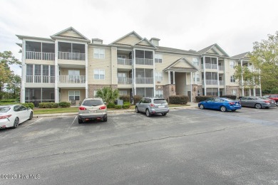 Perfect first floor 2BR/2BA beach condo priced to sell with on Crow Creek Golf Club in North Carolina - for sale on GolfHomes.com, golf home, golf lot