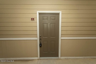 Perfect first floor 2BR/2BA beach condo priced to sell with on Crow Creek Golf Club in North Carolina - for sale on GolfHomes.com, golf home, golf lot