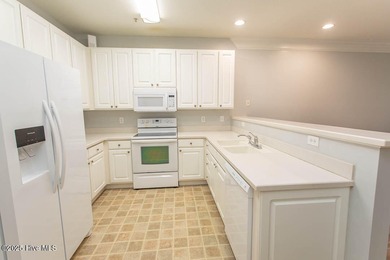 Perfect first floor 2BR/2BA beach condo priced to sell with on Crow Creek Golf Club in North Carolina - for sale on GolfHomes.com, golf home, golf lot