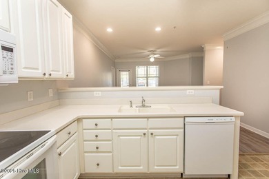 Perfect first floor 2BR/2BA beach condo priced to sell with on Crow Creek Golf Club in North Carolina - for sale on GolfHomes.com, golf home, golf lot