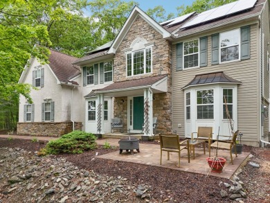 OPEN HOUSE 5/31/2025 - 11:00-1:00 Perched atop a scenic hilltop on Country Club of the Poconos Golf Course in Pennsylvania - for sale on GolfHomes.com, golf home, golf lot