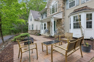 OPEN HOUSE 5/31/2025 - 11:00-1:00 Perched atop a scenic hilltop on Country Club of the Poconos Golf Course in Pennsylvania - for sale on GolfHomes.com, golf home, golf lot