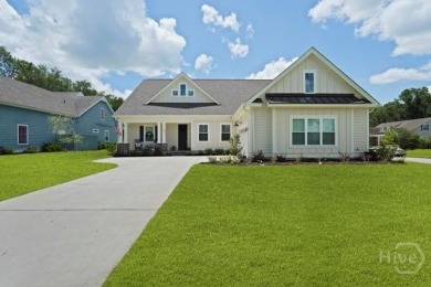 This stunning 4-bed, 3.5-bath in the gated Savannah Quarters on Savannah Quarters Country Club in Georgia - for sale on GolfHomes.com, golf home, golf lot