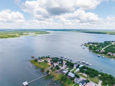 Lakefront Luxury with Unmatched Views and Entertaining Space

 on Hideout Golf Club and Resort  in Texas - for sale on GolfHomes.com, golf home, golf lot