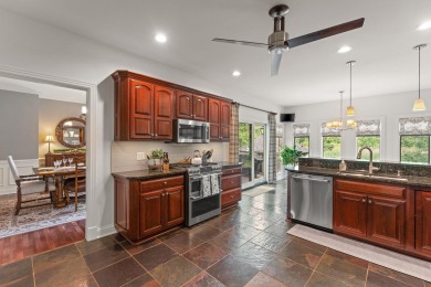 Welcome to this impeccably maintained 5-bed, 3.5-bath brick on Sand Creek Golf and Country Club  in Indiana - for sale on GolfHomes.com, golf home, golf lot