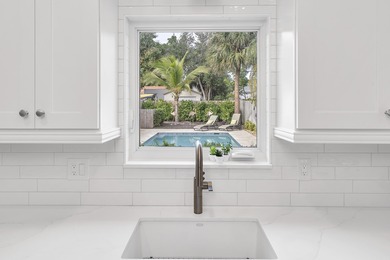 Stunning, fully renovated, 3/2 pool home in desirable Parrot on Lake Worth Municipal Golf Course in Florida - for sale on GolfHomes.com, golf home, golf lot