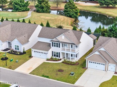 Experience elevated coastal living in this luxury 4-bedroom home on Crow Creek Golf Club in North Carolina - for sale on GolfHomes.com, golf home, golf lot