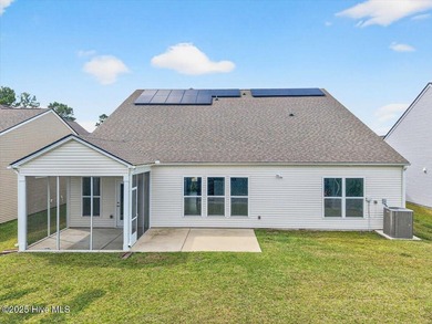 Experience elevated coastal living in this luxury 4-bedroom home on Crow Creek Golf Club in North Carolina - for sale on GolfHomes.com, golf home, golf lot