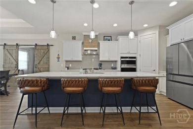 This stunning 4-bed, 3.5-bath in the gated Savannah Quarters on Savannah Quarters Country Club in Georgia - for sale on GolfHomes.com, golf home, golf lot