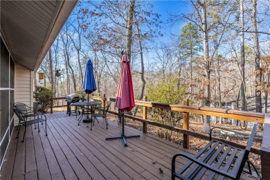 Enjoy seasonal views of Lake Keowee within the desirable full on Keowee Key Golf and Country Club in South Carolina - for sale on GolfHomes.com, golf home, golf lot