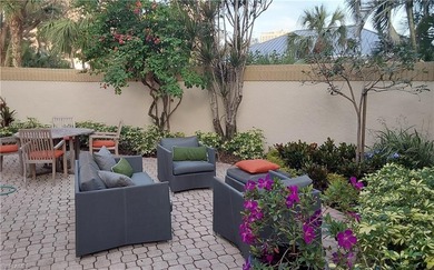 A rare opportunity awaits to own a modern-style villa that lives on Club at Pelican Bay Golf Course in Florida - for sale on GolfHomes.com, golf home, golf lot