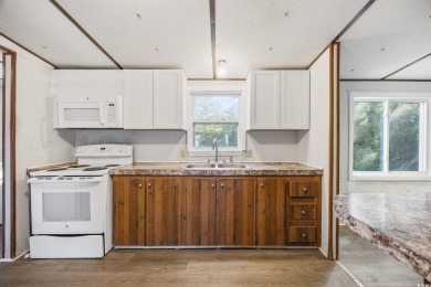 Discover your ideal beachside escape in the desirable Windjammer on Indian Wells Golf Course in South Carolina - for sale on GolfHomes.com, golf home, golf lot