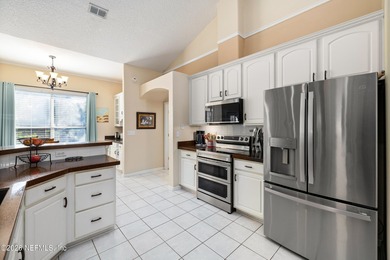 Beautiful home in the highly desirable Eagle Harbor community on Eagle Harbor Golf Club in Florida - for sale on GolfHomes.com, golf home, golf lot