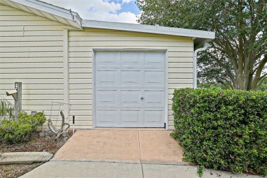 Priced Below Market--Investor or Handyman Special! This split on The Links of Spruce Creek in Florida - for sale on GolfHomes.com, golf home, golf lot