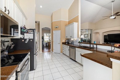 Beautiful home in the highly desirable Eagle Harbor community on Eagle Harbor Golf Club in Florida - for sale on GolfHomes.com, golf home, golf lot