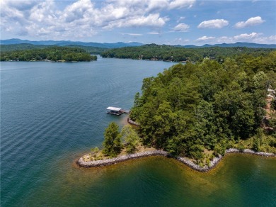 Positioned on one of Lake Keowee's most coveted point lots, this on The Cliffs At Keowee Vineyards Golf Club in South Carolina - for sale on GolfHomes.com, golf home, golf lot
