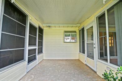 Priced Below Market--Investor or Handyman Special! This split on The Links of Spruce Creek in Florida - for sale on GolfHomes.com, golf home, golf lot