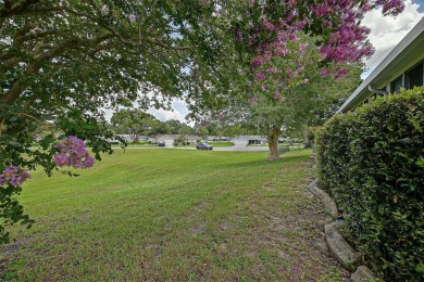 Priced Below Market--Investor or Handyman Special! This split on The Links of Spruce Creek in Florida - for sale on GolfHomes.com, golf home, golf lot