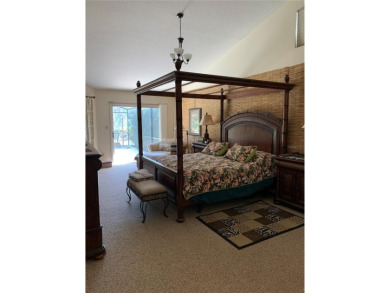 Environmental Home Builders built this absolutely stunning home on Tuscawilla Country Club in Florida - for sale on GolfHomes.com, golf home, golf lot