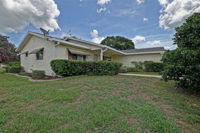 Priced Below Market--Investor or Handyman Special! This split on The Links of Spruce Creek in Florida - for sale on GolfHomes.com, golf home, golf lot