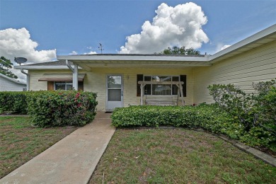 Priced Below Market--Investor or Handyman Special! This split on The Links of Spruce Creek in Florida - for sale on GolfHomes.com, golf home, golf lot