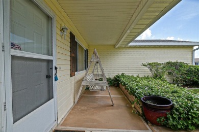 Priced Below Market--Investor or Handyman Special! This split on The Links of Spruce Creek in Florida - for sale on GolfHomes.com, golf home, golf lot