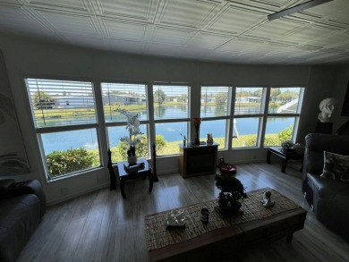 Spacious Lake-Front Garage Home with best view of the lake in on Vista Plantation Golf Club in Florida - for sale on GolfHomes.com, golf home, golf lot