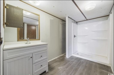 Discover your ideal beachside escape in the desirable Windjammer on Indian Wells Golf Course in South Carolina - for sale on GolfHomes.com, golf home, golf lot