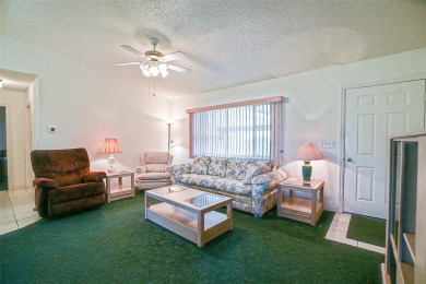 Priced Below Market--Investor or Handyman Special! This split on The Links of Spruce Creek in Florida - for sale on GolfHomes.com, golf home, golf lot