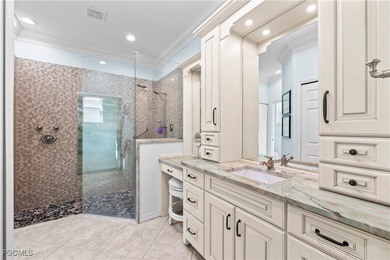 EXTRAS GALORE! FULLY CUSTOM LAKEFRONT LUXURY... MOVE-IN READY on Herons Glen Golf and Country Club in Florida - for sale on GolfHomes.com, golf home, golf lot