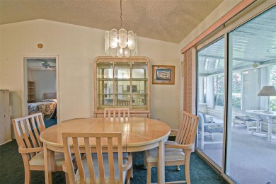 Priced Below Market--Investor or Handyman Special! This split on The Links of Spruce Creek in Florida - for sale on GolfHomes.com, golf home, golf lot