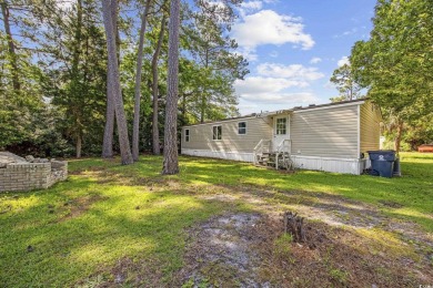 Discover your ideal beachside escape in the desirable Windjammer on Indian Wells Golf Course in South Carolina - for sale on GolfHomes.com, golf home, golf lot
