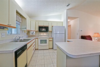 Priced Below Market--Investor or Handyman Special! This split on The Links of Spruce Creek in Florida - for sale on GolfHomes.com, golf home, golf lot