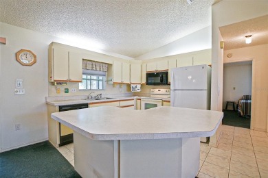 Priced Below Market--Investor or Handyman Special! This split on The Links of Spruce Creek in Florida - for sale on GolfHomes.com, golf home, golf lot