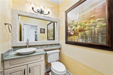 EXTRAS GALORE! FULLY CUSTOM LAKEFRONT LUXURY... MOVE-IN READY on Herons Glen Golf and Country Club in Florida - for sale on GolfHomes.com, golf home, golf lot