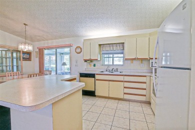 Priced Below Market--Investor or Handyman Special! This split on The Links of Spruce Creek in Florida - for sale on GolfHomes.com, golf home, golf lot