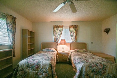 Priced Below Market--Investor or Handyman Special! This split on The Links of Spruce Creek in Florida - for sale on GolfHomes.com, golf home, golf lot