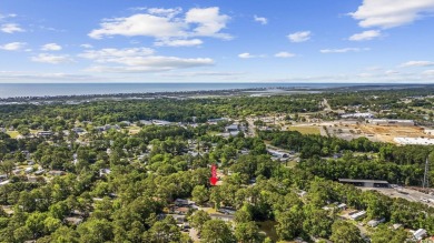 Discover your ideal beachside escape in the desirable Windjammer on Indian Wells Golf Course in South Carolina - for sale on GolfHomes.com, golf home, golf lot