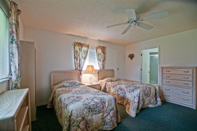 Priced Below Market--Investor or Handyman Special! This split on The Links of Spruce Creek in Florida - for sale on GolfHomes.com, golf home, golf lot