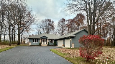 This spacious 4-bedroom, 2-bathroom home offers the best of both on Quest Golf Club in Michigan - for sale on GolfHomes.com, golf home, golf lot