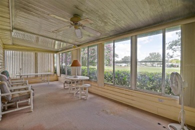 Priced Below Market--Investor or Handyman Special! This split on The Links of Spruce Creek in Florida - for sale on GolfHomes.com, golf home, golf lot