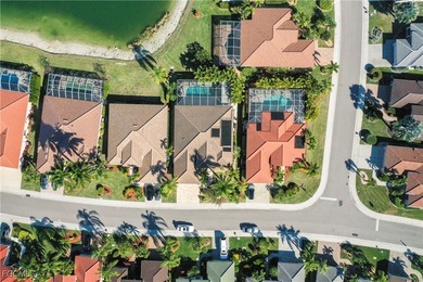 EXTRAS GALORE! FULLY CUSTOM LAKEFRONT LUXURY... MOVE-IN READY on Herons Glen Golf and Country Club in Florida - for sale on GolfHomes.com, golf home, golf lot