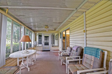 Priced Below Market--Investor or Handyman Special! This split on The Links of Spruce Creek in Florida - for sale on GolfHomes.com, golf home, golf lot
