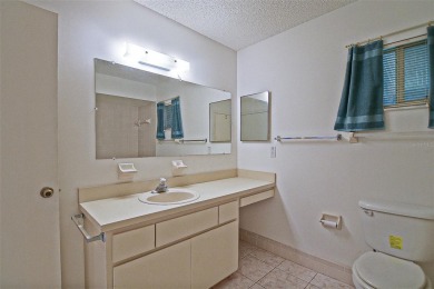 Priced Below Market--Investor or Handyman Special! This split on The Links of Spruce Creek in Florida - for sale on GolfHomes.com, golf home, golf lot
