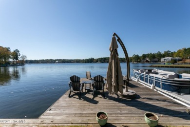 Enjoy luxurious lake front living at its finest in this on Beacon Ridge Golf and Country Club in North Carolina - for sale on GolfHomes.com, golf home, golf lot